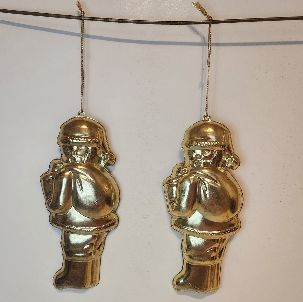 Pair of Vintage Brass Santa ornaments